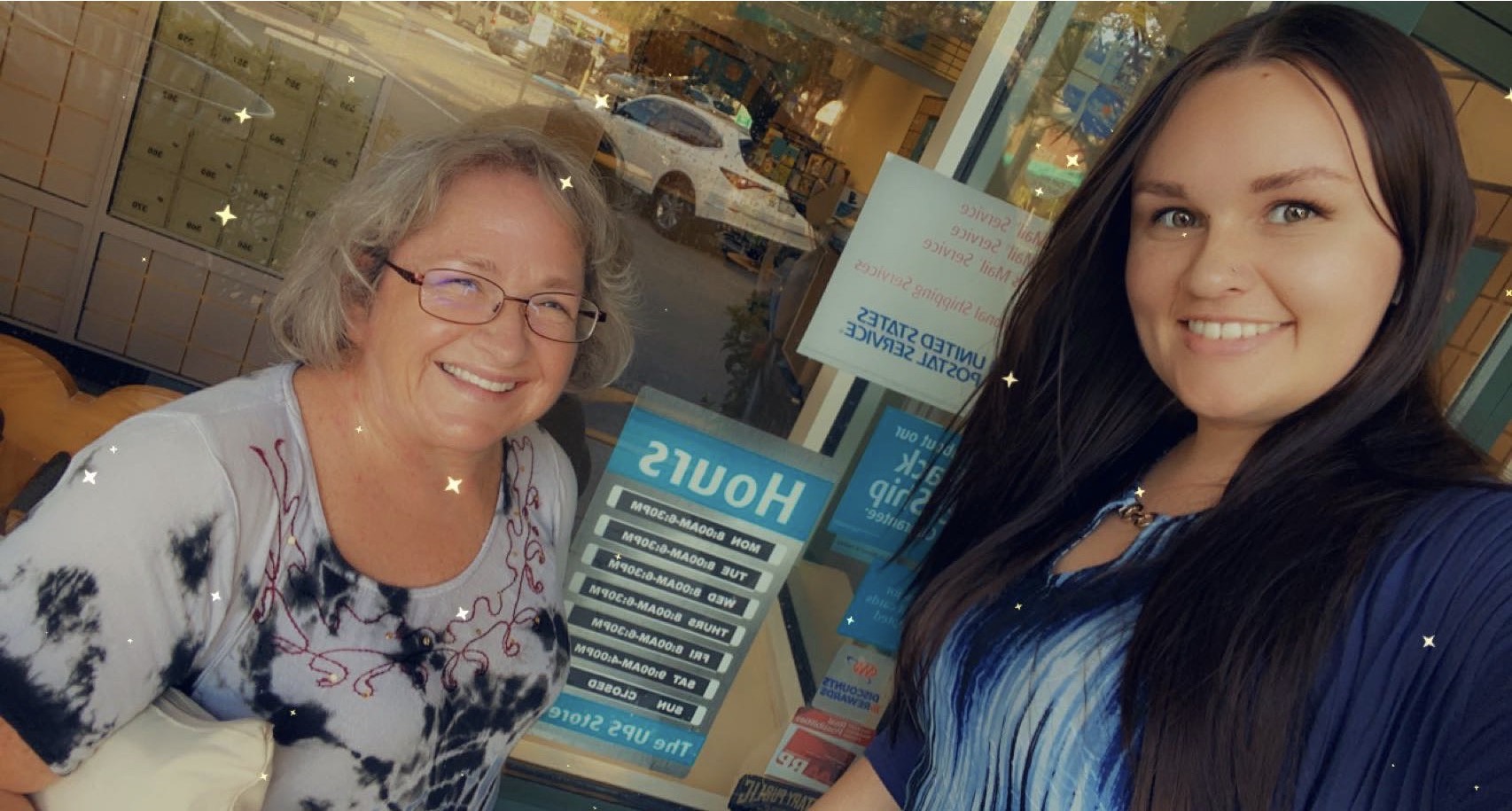 Photo of Amy and Jorjia outside of a UPS store